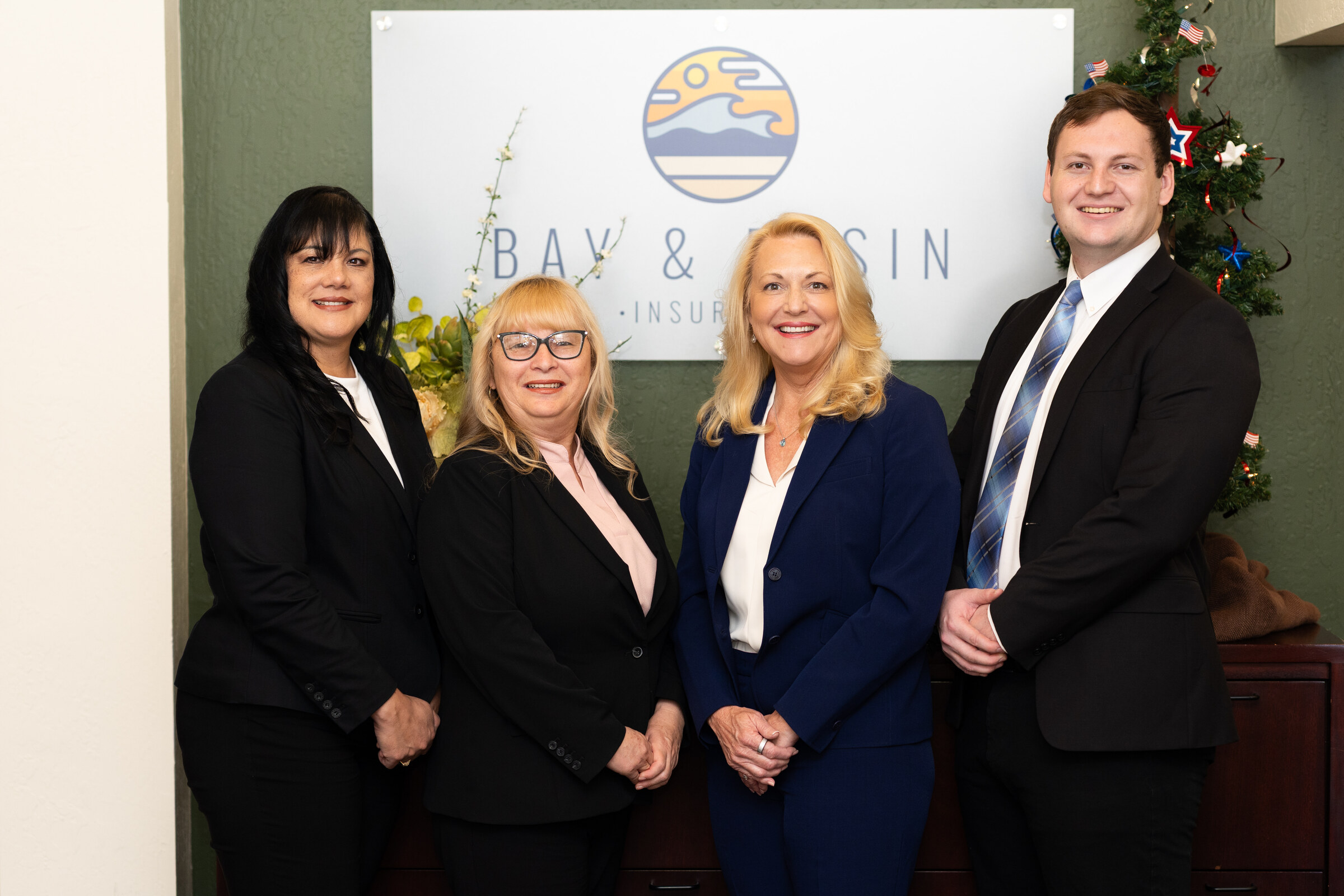 Bay and Basin Insurance team working together indoors